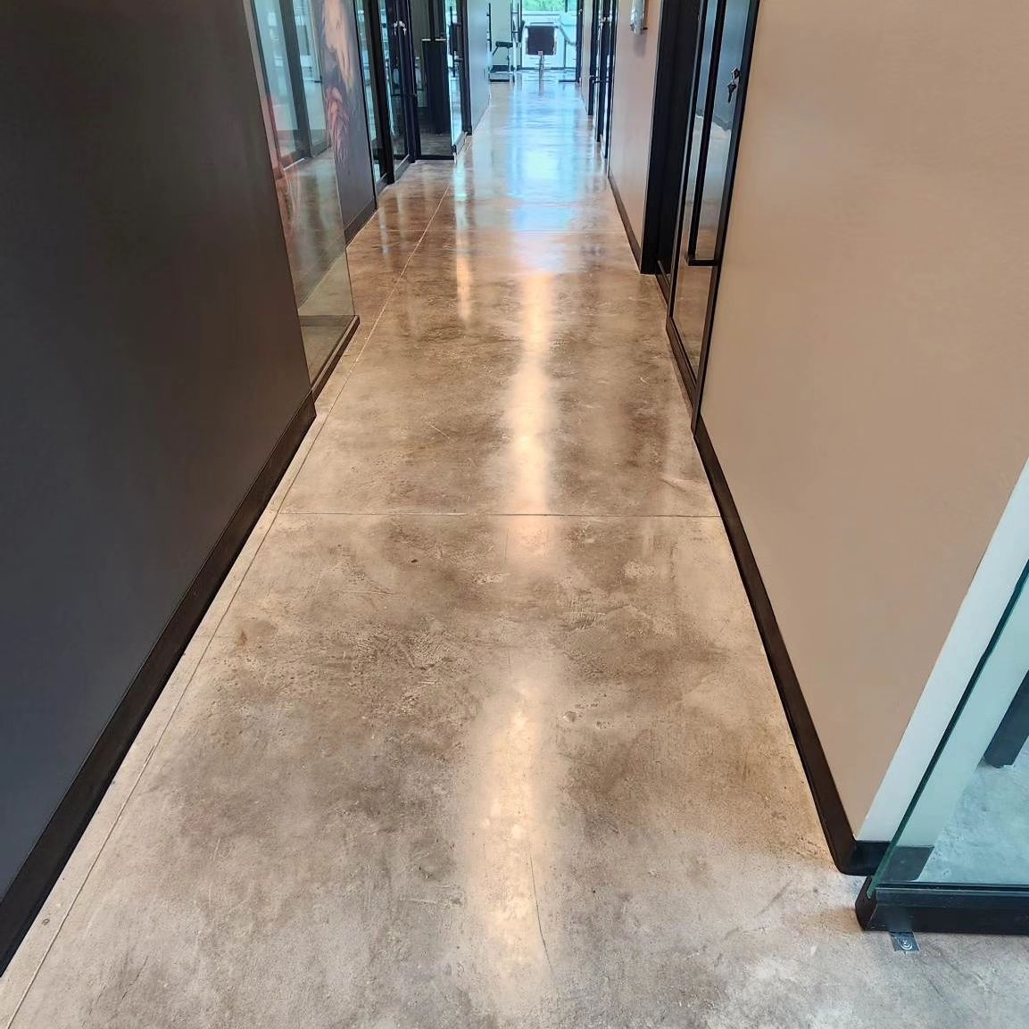 newly polished and stained concrete hallway