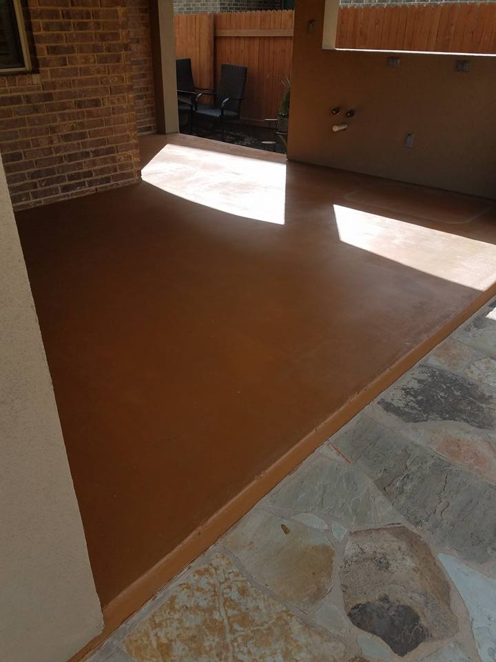 Resurfaced stained concrete patio Austin